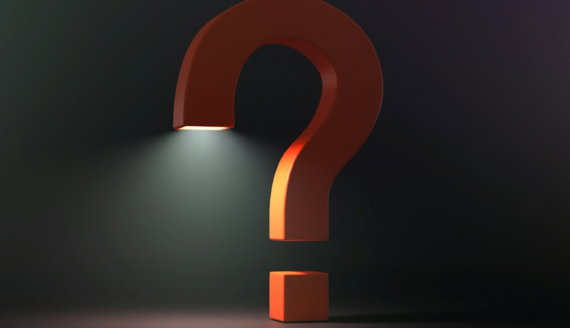 a-large-orange-question-mark-illuminated-by-a-bright-light-from-below.jpg A large orange question mark illuminated by a bright light from below